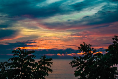 Scenic view of sea against romantic sky