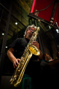 Man playing at music concert