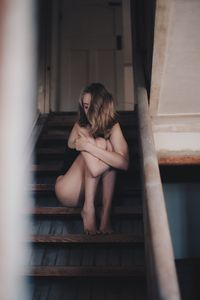 Man sitting on staircase