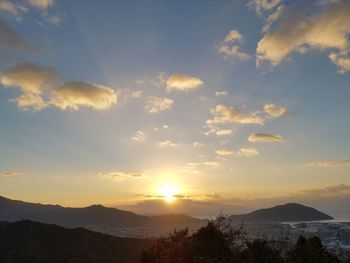 Scenic view of mountains against sky during sunset