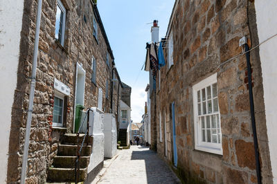 Narrow alley amidst buildings