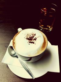 Close-up of coffee cup on table