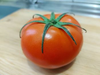 Close-up of orange fruit on table