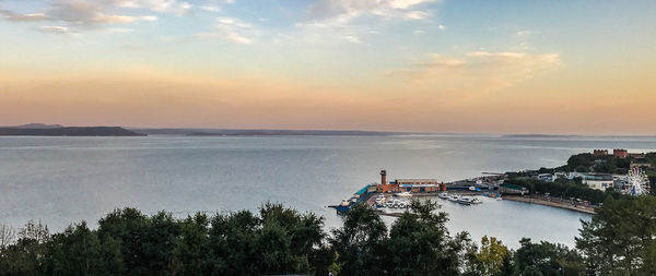 Scenic view of sea against sky at sunset