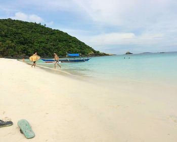 Scenic view of beach against sky