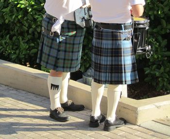 Low section of people standing on floor
