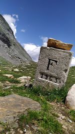 Built structure on mountain against sky