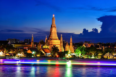 Illuminated cathedral against sky at night