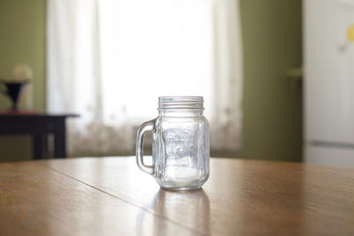 Close-up of jar on table