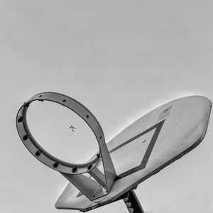 Low angle view of basketball hoop against sky