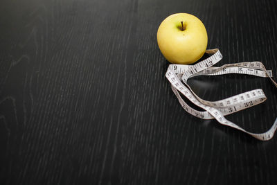 High angle view of apple on table