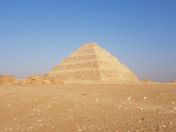 View of desert against clear sky