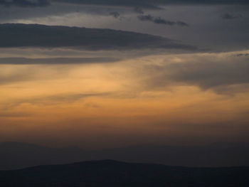 Low angle view of dramatic sky during sunset