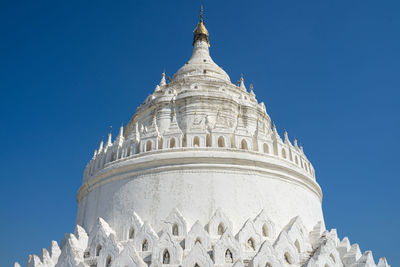 Low angle view of a building against clear blue sky