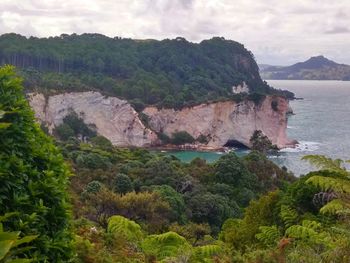 Scenic view of sea against cloudy sky