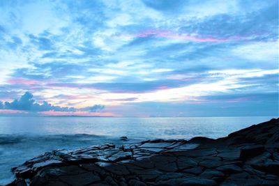 Scenic view of sea against sky during sunset