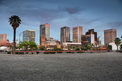 View of city buildings against sky