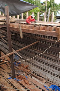 Man working on wood