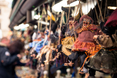 Close-up of spooky toys for sale at market stall