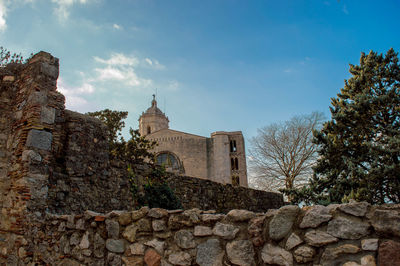 Low angle view of old building against sky