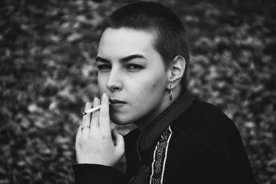 Portrait of young woman looking away