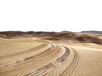 Scenic view of desert against clear sky