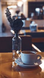 Close-up of coffee cup on table