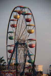 Ferris wheel against sky at amusement park