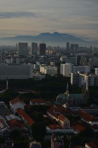 High angle view of buildings against sky during sunset