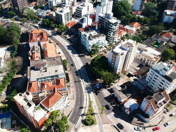 High angle view of road amidst buildings in city