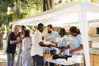 Rear view of people sitting at restaurant