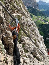 Close-up of safety harness hanging from rope