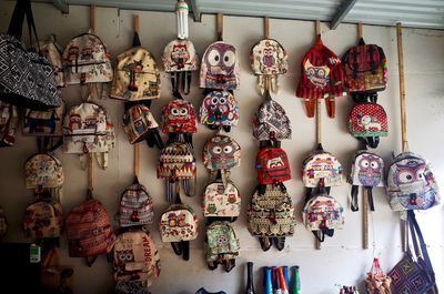 Clothes hanging for sale at market stall