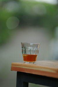 Close-up of tea in glass on table