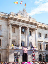 Group of people in front of historical building