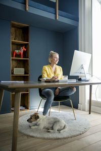 Woman in office using computer