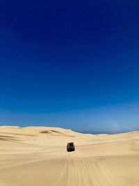 Scenic view of desert against sky