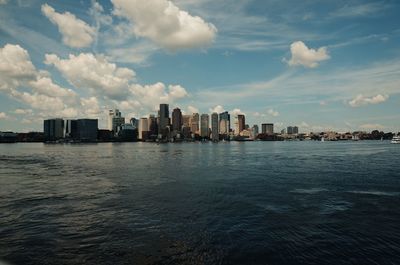 Sea with city in background