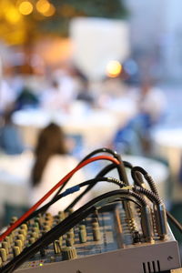 Close-up of telephone on table in city
