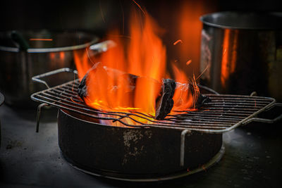 Close-up of fire on barbecue grill