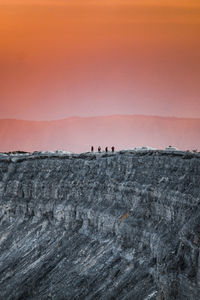 Scenic view of landscape against sky during sunset