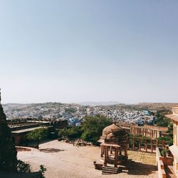 View of cityscape against clear sky