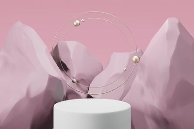 Close-up of illuminated electric lamp against wall