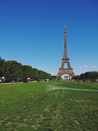 View of eiffel tower against blue sky