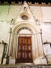 Low angle view of closed door of building