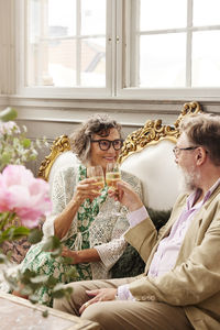 Couple having drink together