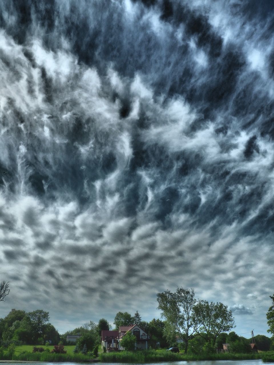 cloud - sky, sky, tree, nature, weather, beauty in nature, storm cloud, storm, scenics, cloudscape, dramatic sky, no people, tranquility, tranquil scene, low angle view, outdoors, day, thunderstorm, hurricane - storm, tornado