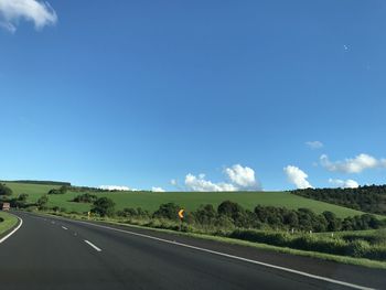 Road against blue sky