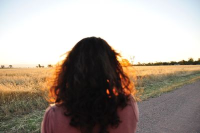 Woman standing on field