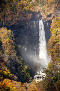 Waterfall in forest during autumn